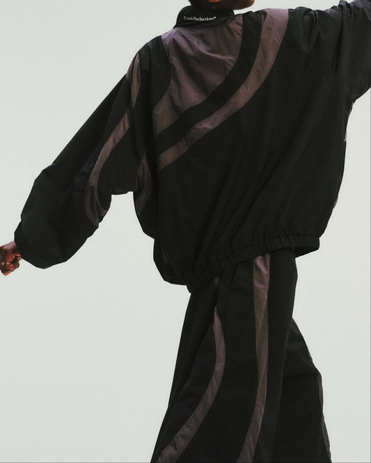 COOTIE | Nylon Paneling Shin Cut Wide Track Pants