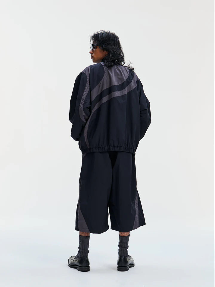 COOTIE | Nylon Paneling Shin Cut Wide Track Pants